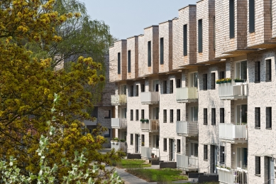 Atelier blauraum and the extensions of residential buildings Treehouses Babelallee in Hamburg - Thanks to its shape, the facade harmonizes with the existing trees in the surrounding green areas. Because of this concept, the houses are referred to as Treehouses. - foto: Fermacell