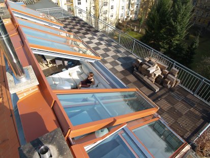 Attic roof windows in a family villa, vineyard house, and unique rooftop apartment - Sliding roof windows Solara PERSPEKTIV combine fixed glazing and side-sliding sashes.