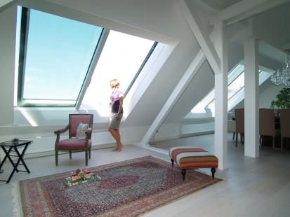 Open attic with sliding skylights - Double-part sliding roof window Solara PERSPEKTIV, made of solid pine in white color