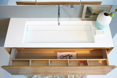 Type and yet made of Corian®? Yes! - VIPP furniture with integrated Corian sink.