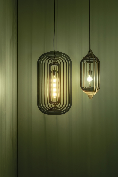 Delta Light introduced three collections of decorative lighting with delicate lines and glass