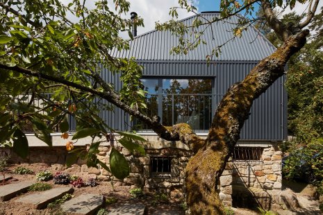 House with a sloped roof and VELUX skylights