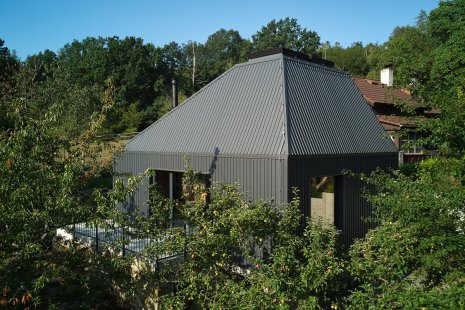 House with a sloped roof and VELUX skylights