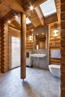 The magic of contrast: concrete plaster in a wooden cabin - foto: Kateřina Gerling