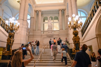 The Royal Palace in Brussels attracts visitors with its restored halls and decoration made from beetle exoskeletons