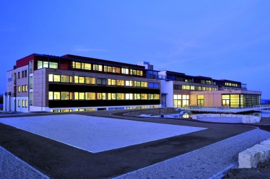 FERMACELL fiber gypsum boards in the world's most energy-efficient office building - The south side of the juwi building facade in the evening